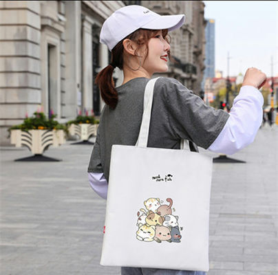 2023 कस्टम लोगो और आकार कैनवास मुद्रित कार्बनिक केलिको शॉपिंग बैग कैनवास लदना महिला शॉपिंग बैग बच्चों के लिए स्कूल बैग